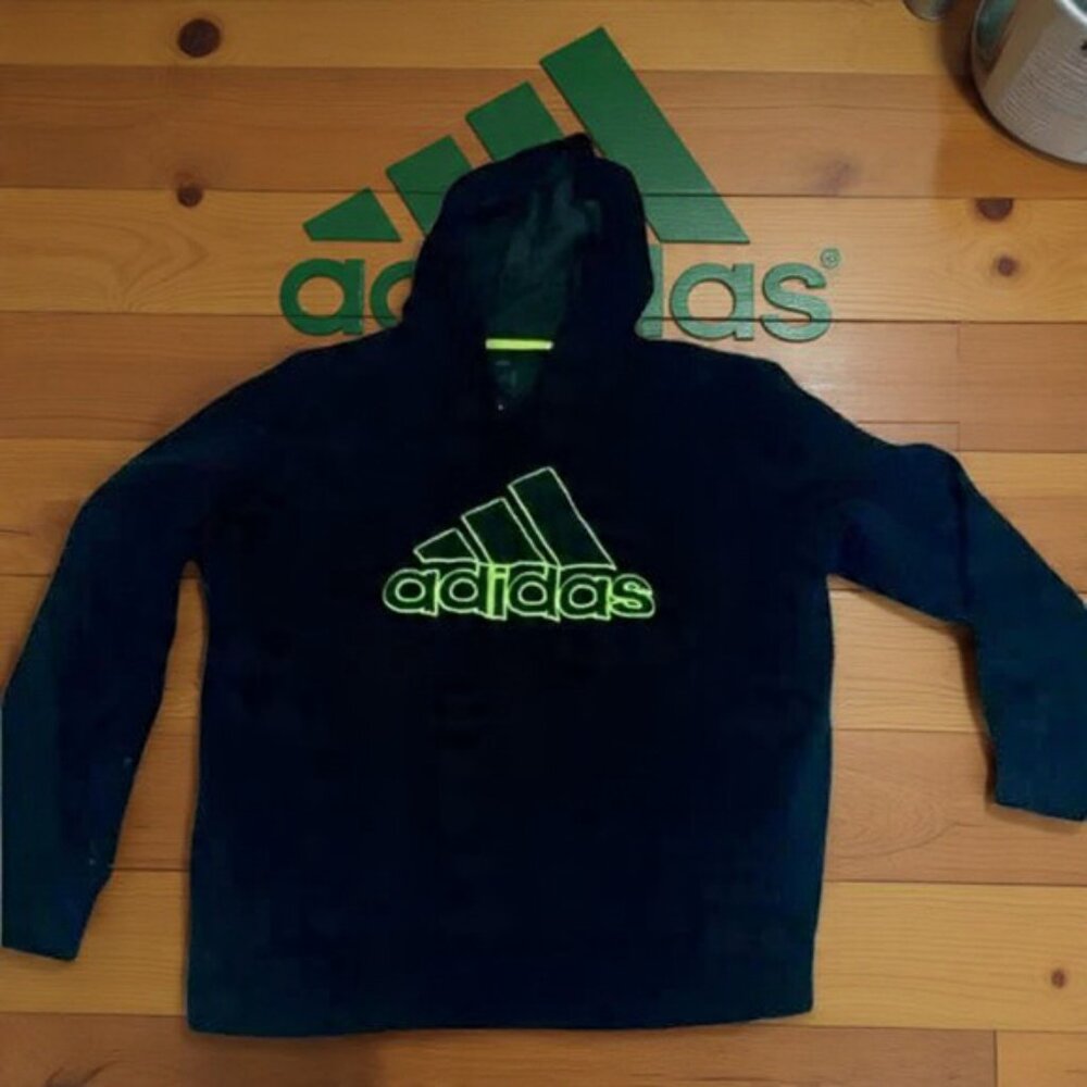 Upgrade Your Casual Look with this Adidas Blue Hoodie featuring Distressed Elbow